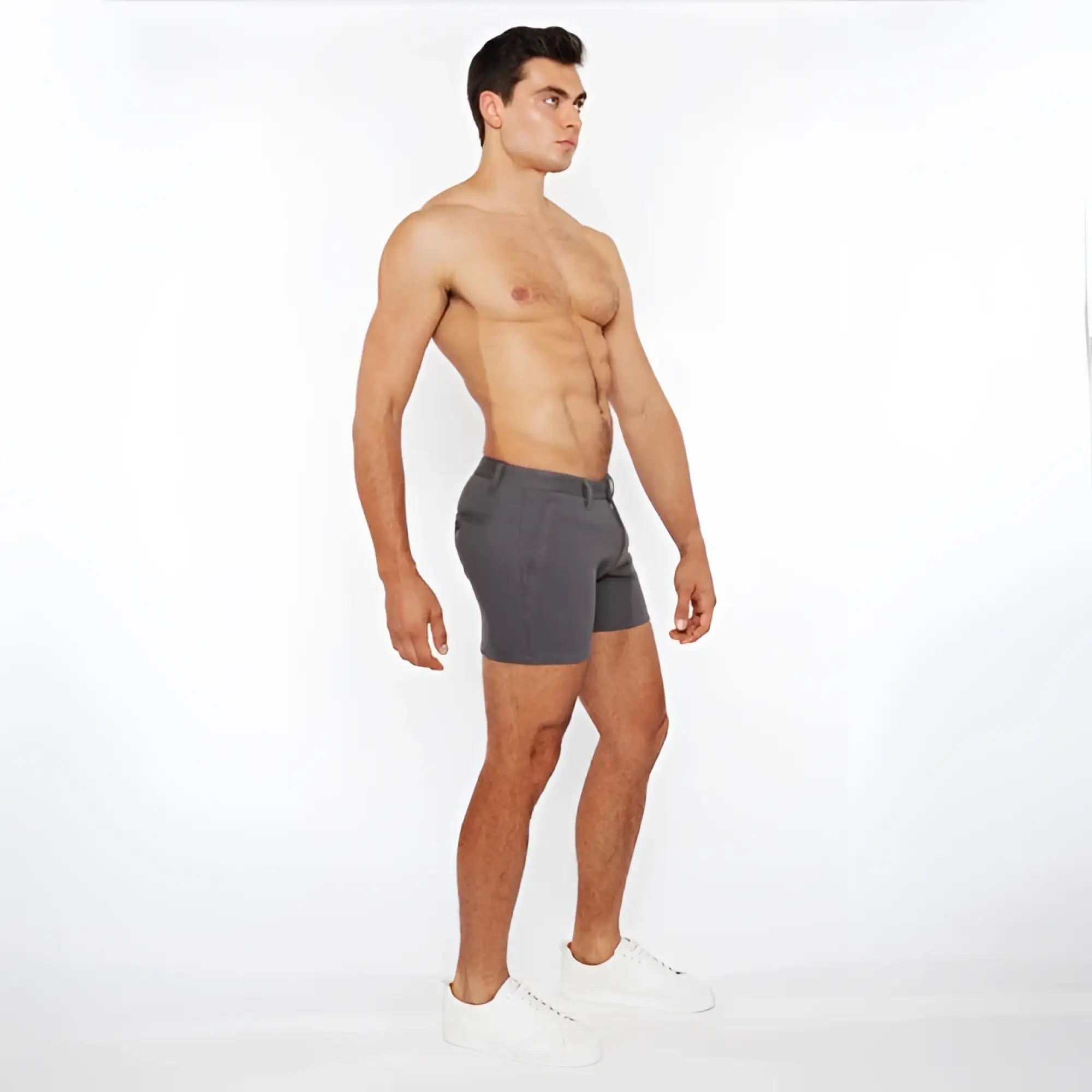 Gray linen-look textured athletic shorts with zip pockets and subtle waistband detail in sleek modern design