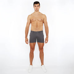 A pair of dark gray slim-fit linen-look textured shorts with zip pockets and a modern clean design