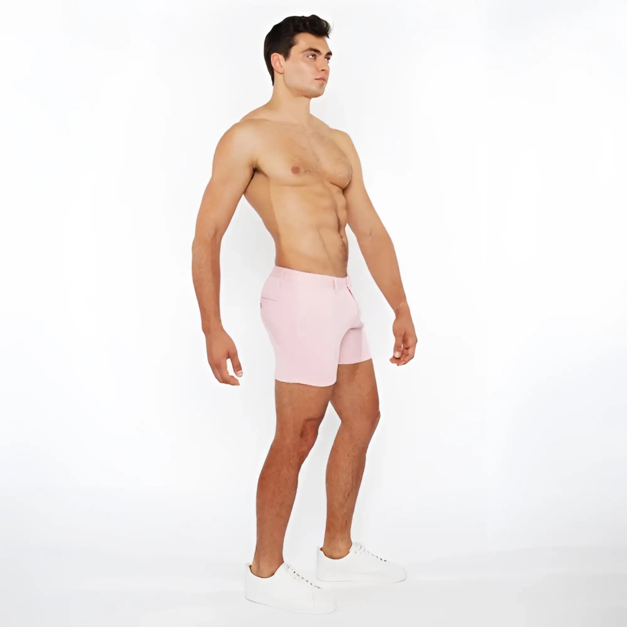Pink linen-look textured athletic shorts with zip pockets featuring a clean minimalist design