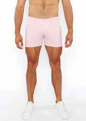 Pink linen-look textured men’s shorts with clean tailored fit and zip pockets featuring subtle stitching details