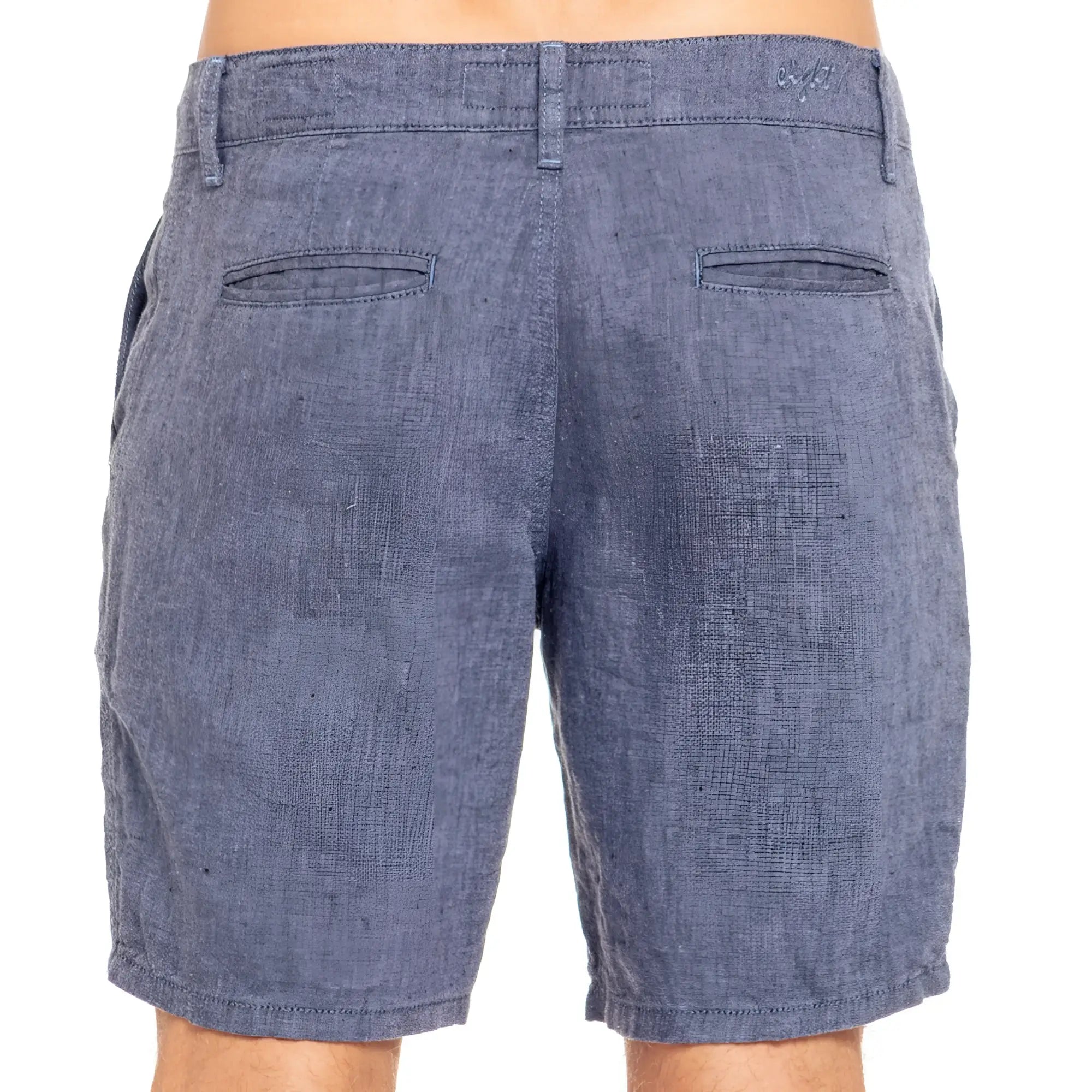 Blue linen slim fit shorts with a heathered denim look and subtle textured weave shown from the back side