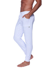 Long cuffed jogger and yoga sweat pants in white cotton with drawstring waist and side pockets for comfortable wear
