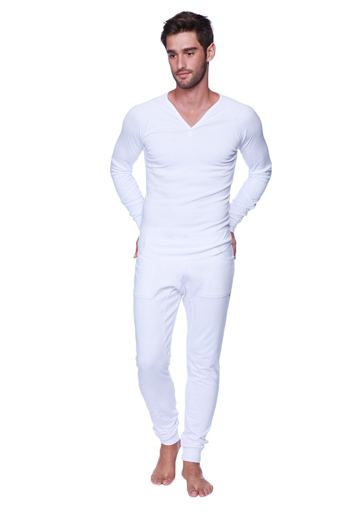 White long-sleeved v-neck thermal suit made from soft fabric for warmth and comfort in cold weather