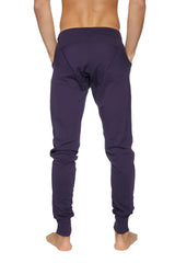 Long cuffed jogger and yoga sweat pants in dark purple soft fabric with elastic cuffs and relaxed fit