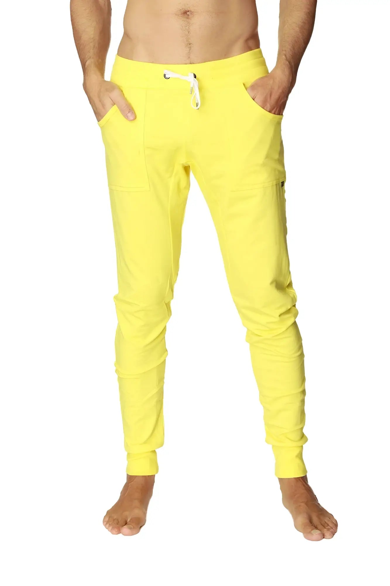 Bright yellow long cuffed jogger and yoga sweat pants with white drawstring waistband and side pockets for activewear