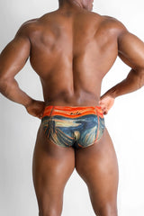 Orange and blue patterned Lovesick Briefs swim trunks featuring Edvard Munchs The Scream design for beachwear