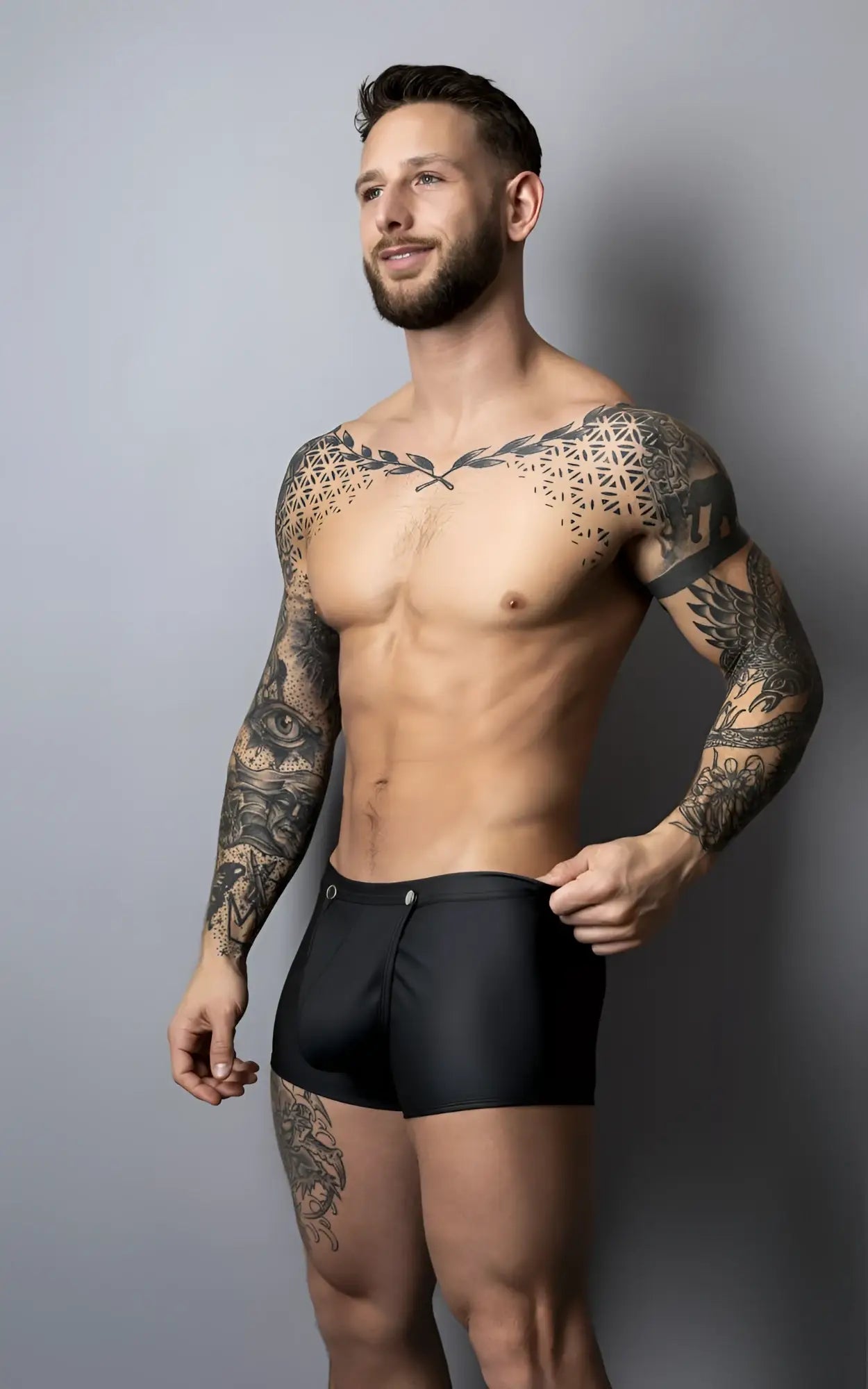 Male power 120-298 oh snap snap off short black swim trunks with sleek form-fitting design and subtle front zipper detail