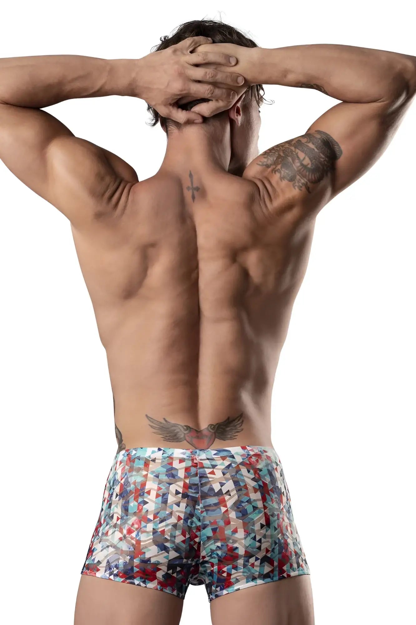 A man wearing male power 131-293 your lace or mine pouch short in red white and blue geometric pattern boxer briefs