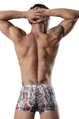 A man wearing male power 131-293 your lace or mine pouch short in red white and blue geometric pattern boxer briefs