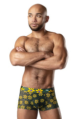 Green boxer briefs with vibrant yellow daisy print with purple centers from male power petal power pouch short line