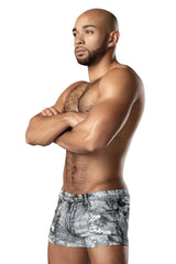 A pair of male power 145-286 distressed denim mini shorts with faded gray wash and frayed hem in denim print