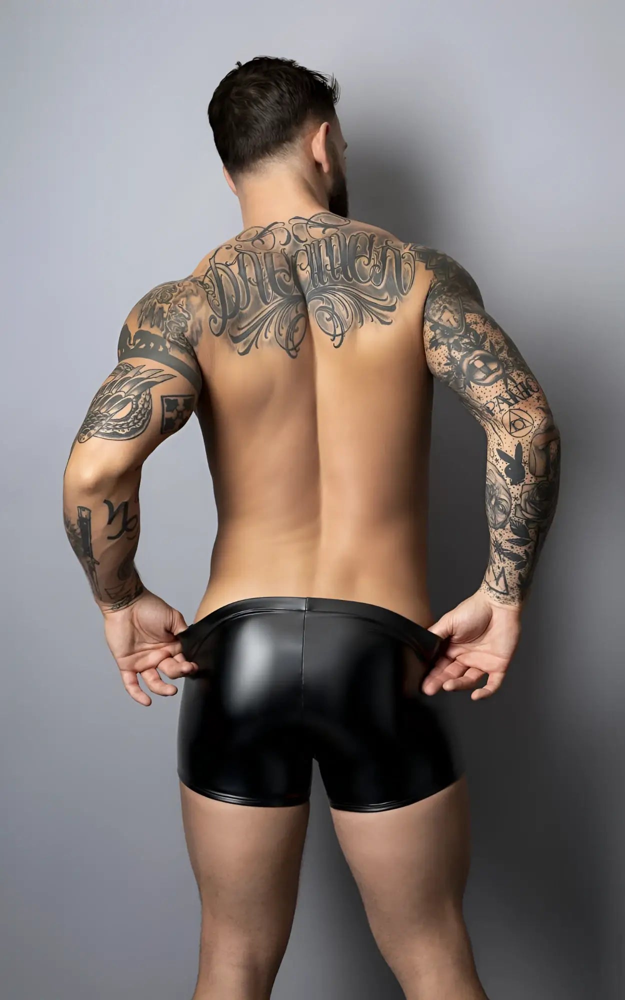 Male Power 153-301 liquid Onyx 2.0 black glossy latex pouch shorts shown from the front side