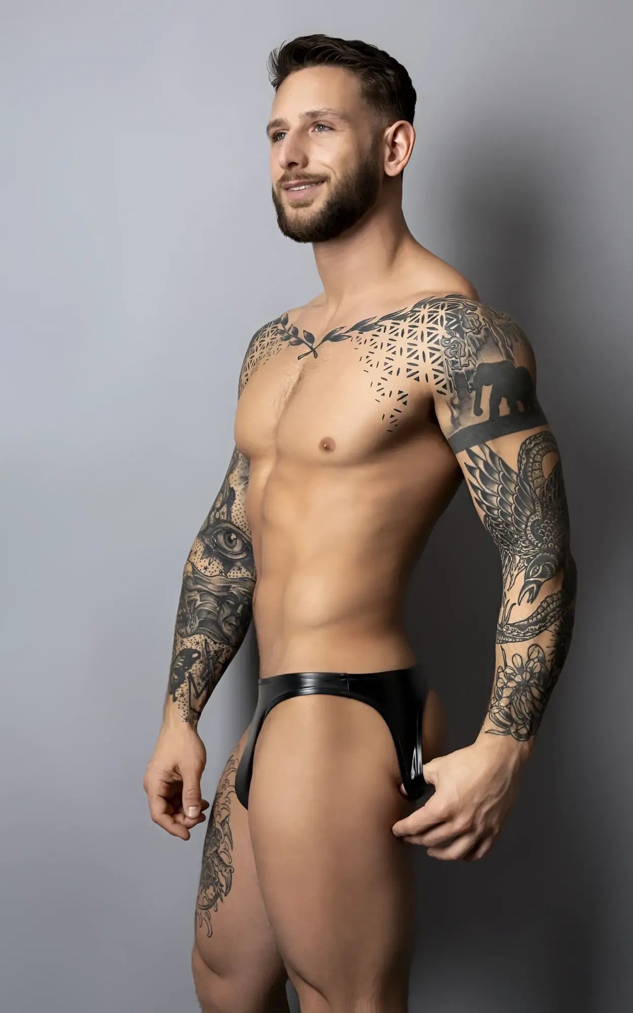 Male power 300-301 liquid onyx 2.0 black latex briefs shown from the back in moonshine color black