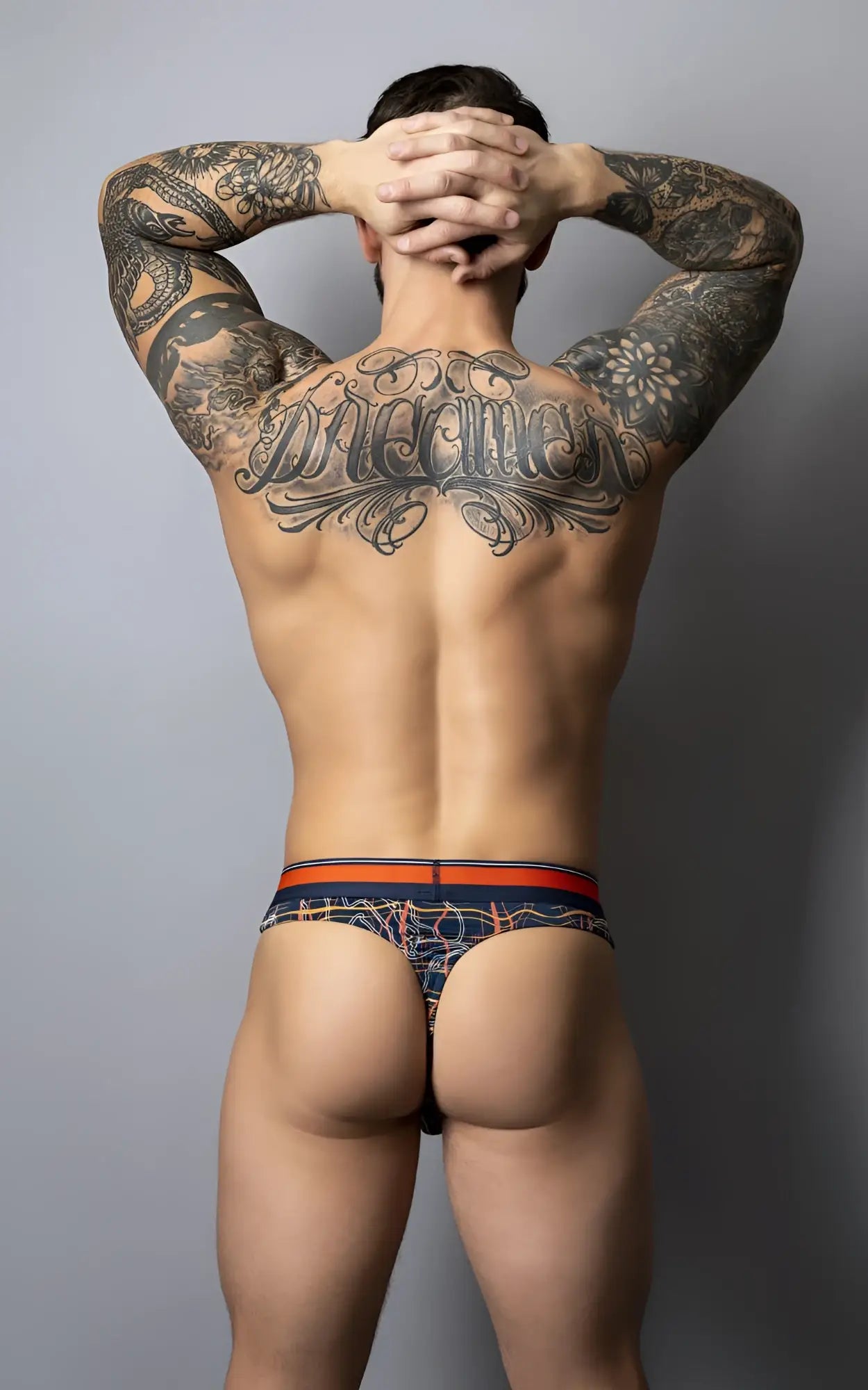 Men’s navy blue and orange patterned Male Power 412-299 Soo Cumfy briefs with a decorative waistband