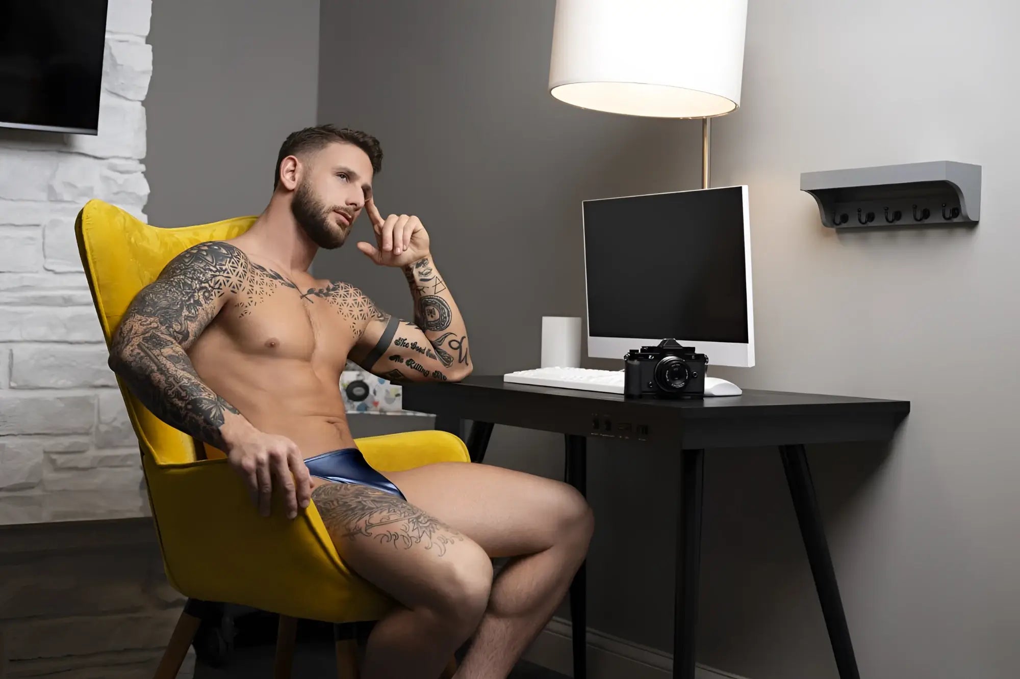 Black classic camera on desk featured with male power 442-301 liquid onyx 2.0 bong thong in blue color