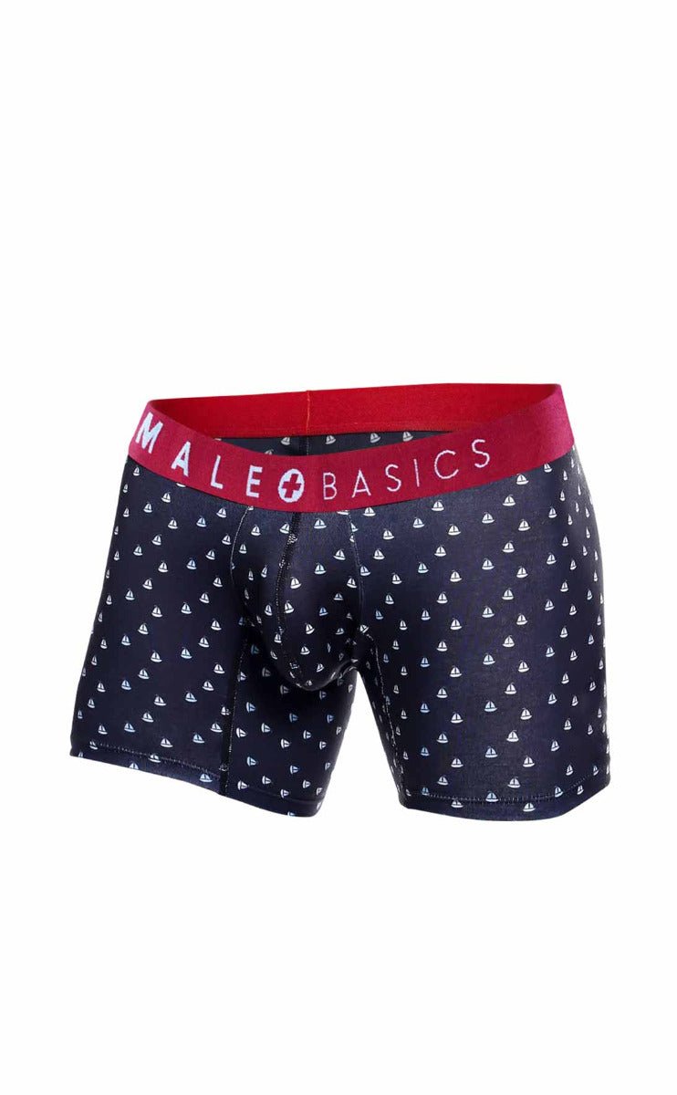 Dark navy male basics boxer briefs with white sailboat pattern and red waistband featuring the brand logo