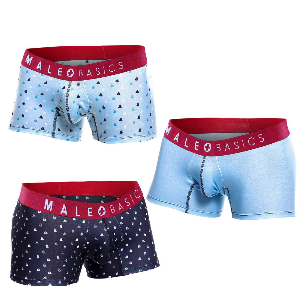 Three pairs of malebasics trunk boxer briefs with red waistbands and blue or navy printed fabric featuring sailboats and triangles