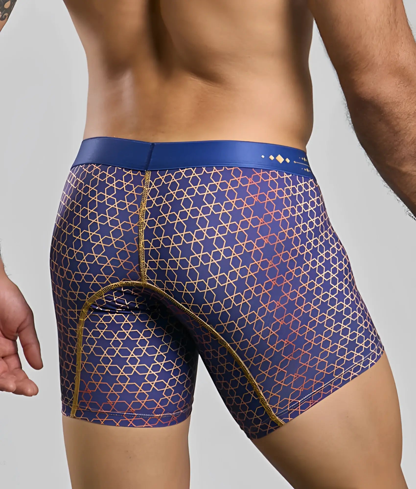 MaleBasics boxer brief hipster in blue with gold and red geometric pattern and matching blue waistband front view