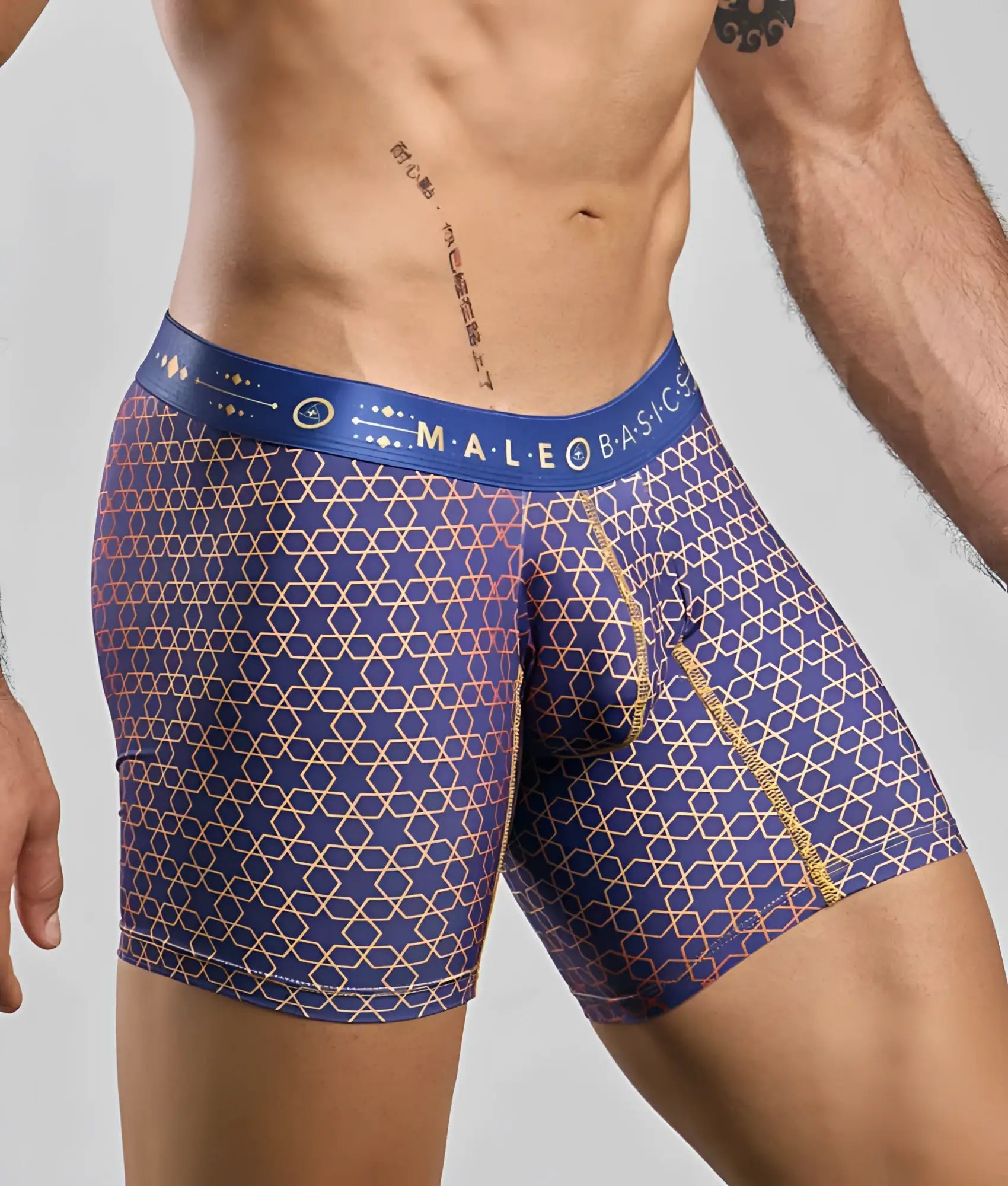 Blue patterned men’s boxer briefs with gold and pink geometric design and male basic waistband hipster style