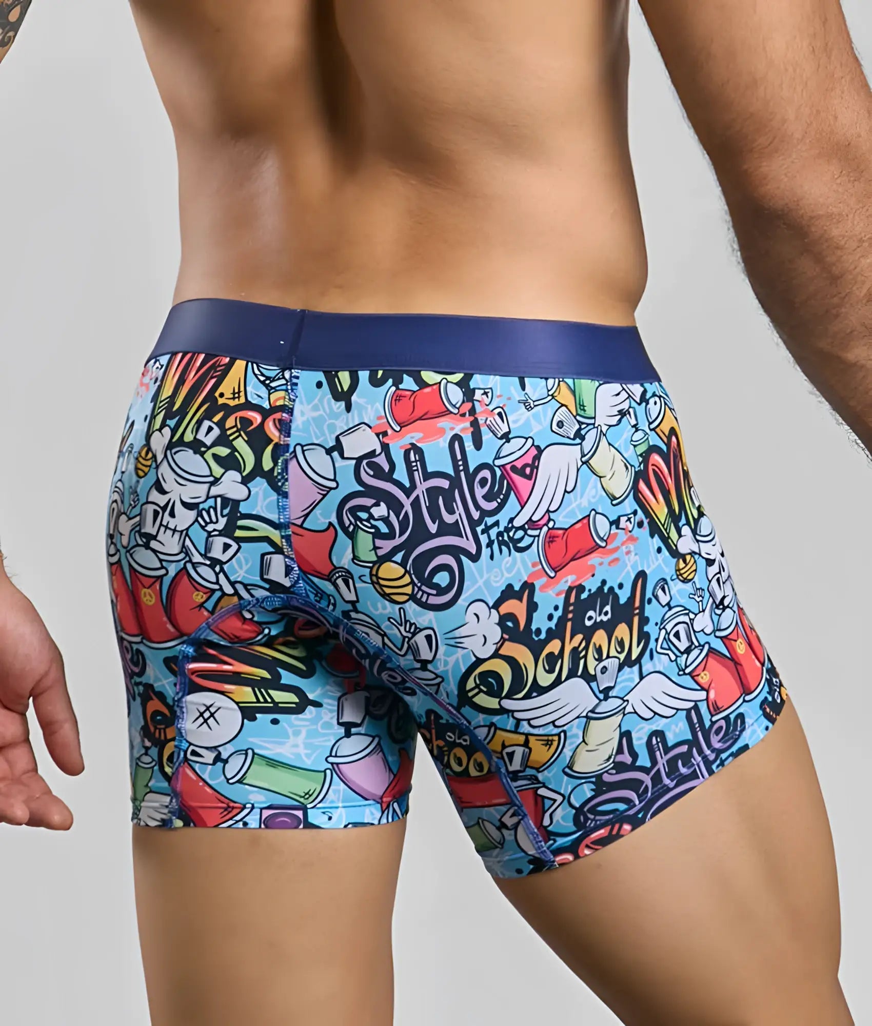 Malebasics boxer brief hipster in vibrant blue with bold graffiti-style spray cans wings and colorful stylized text