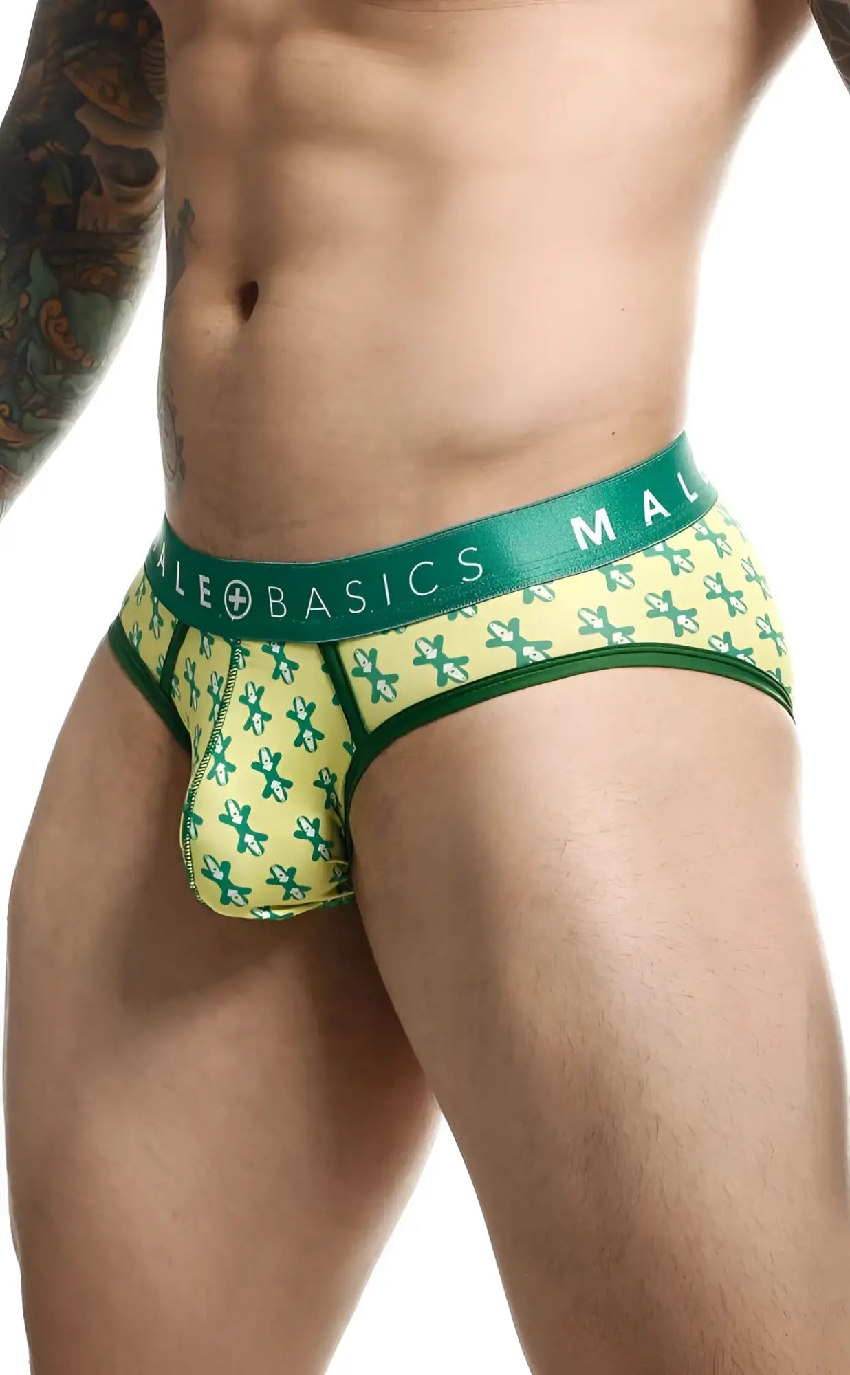 Malebasics brief sexy pouch featuring green and yellow patterned fabric with a bold green waistband and brand name
