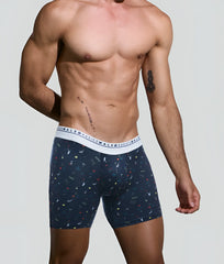 Navy blue malebasics bundle boxer briefs with white elastic waistband and colorful abstract patterns on fabric
