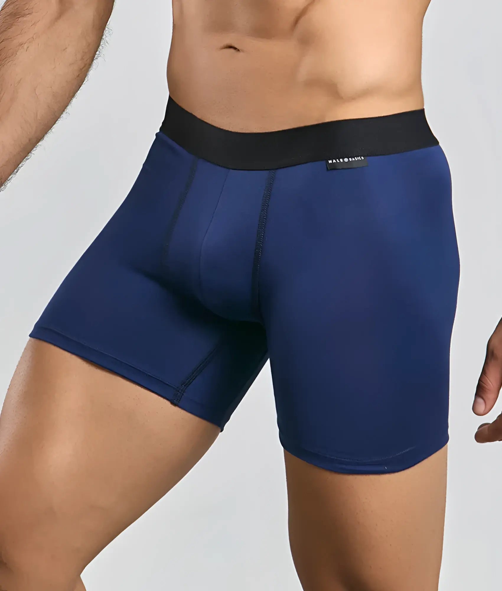 Navy blue men’s boxer briefs with black elastic waistband and mateo baka label from malebasics classic tripack
