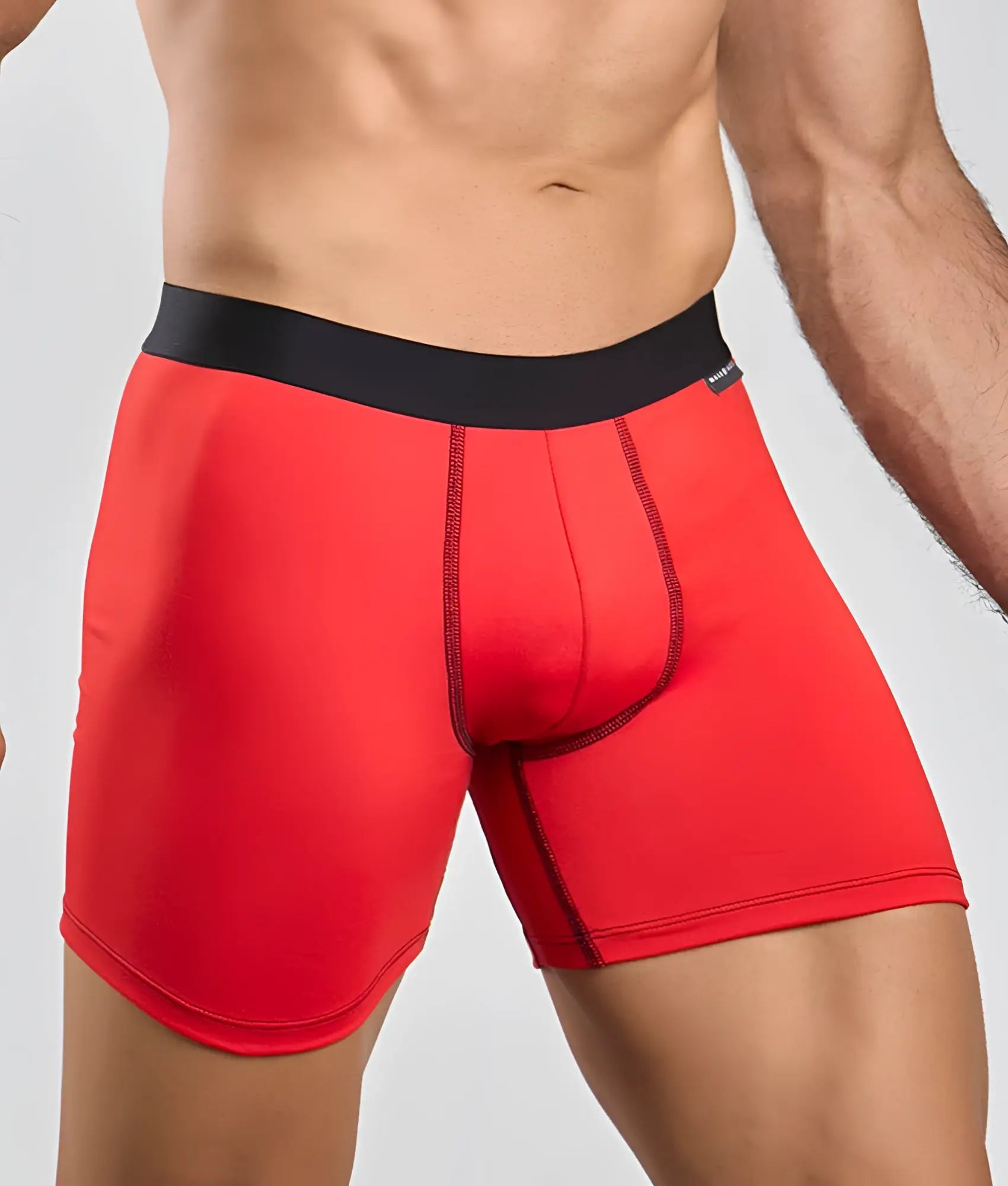 Red boxer briefs with black elastic waistband from malebasics classic tripack made of soft breathable fabric