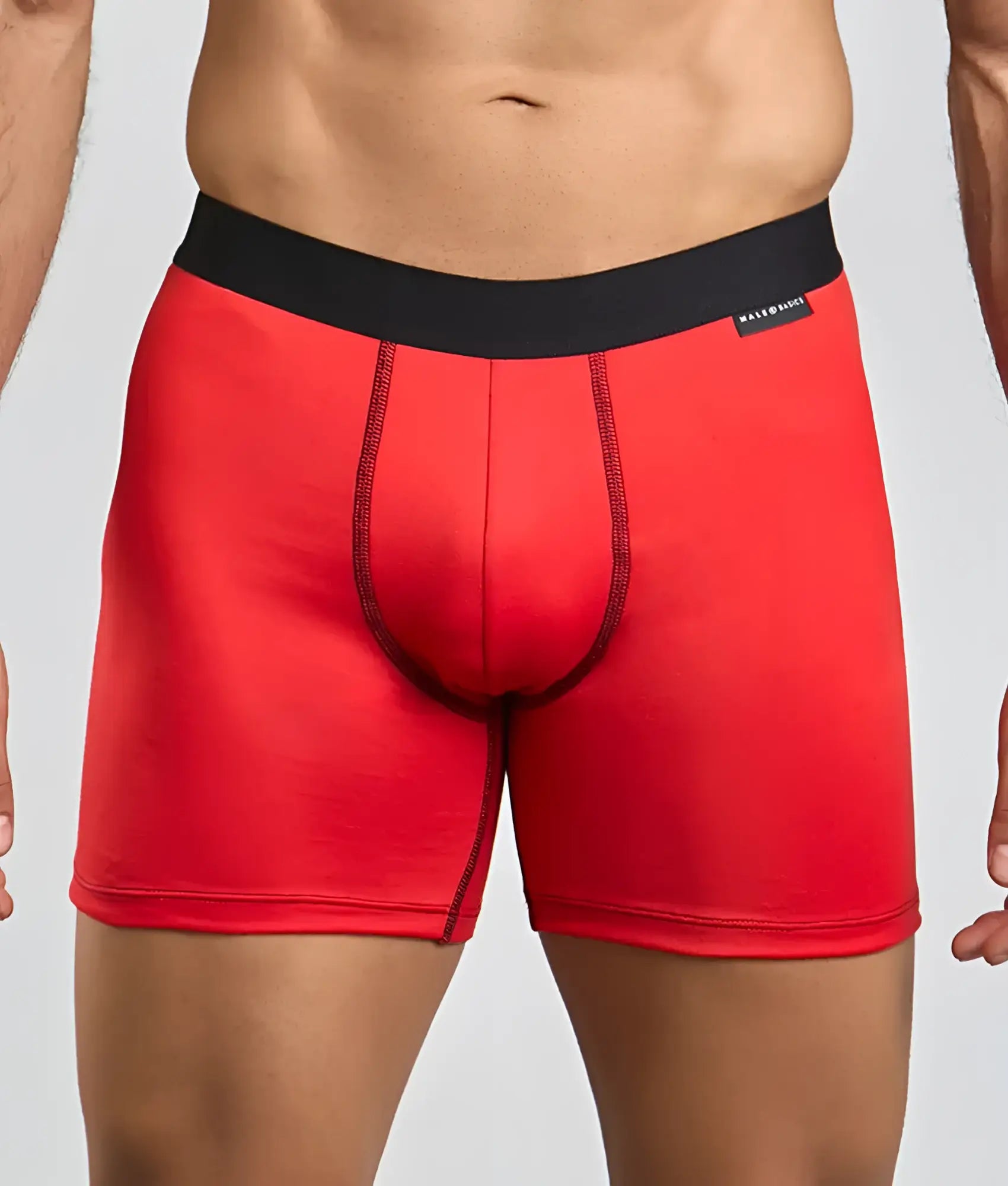 Red men’s boxer briefs from malebasics classic tripack with black elastic waistband and subtle stitching details