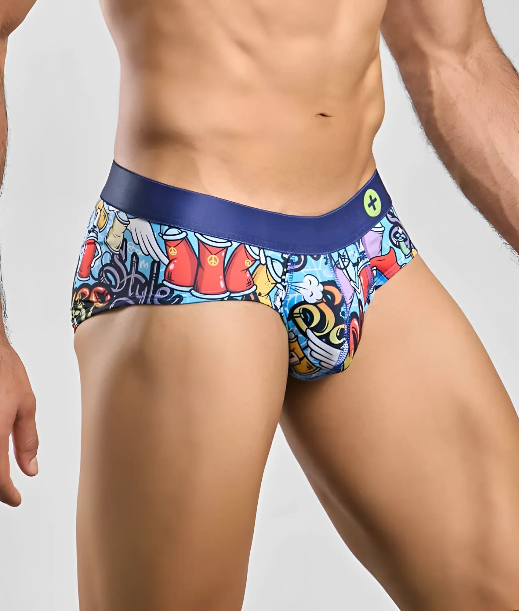 Malebasics hipster brief comics featuring vibrant graffiti-style print with colorful cartoon graphics and navy waistband