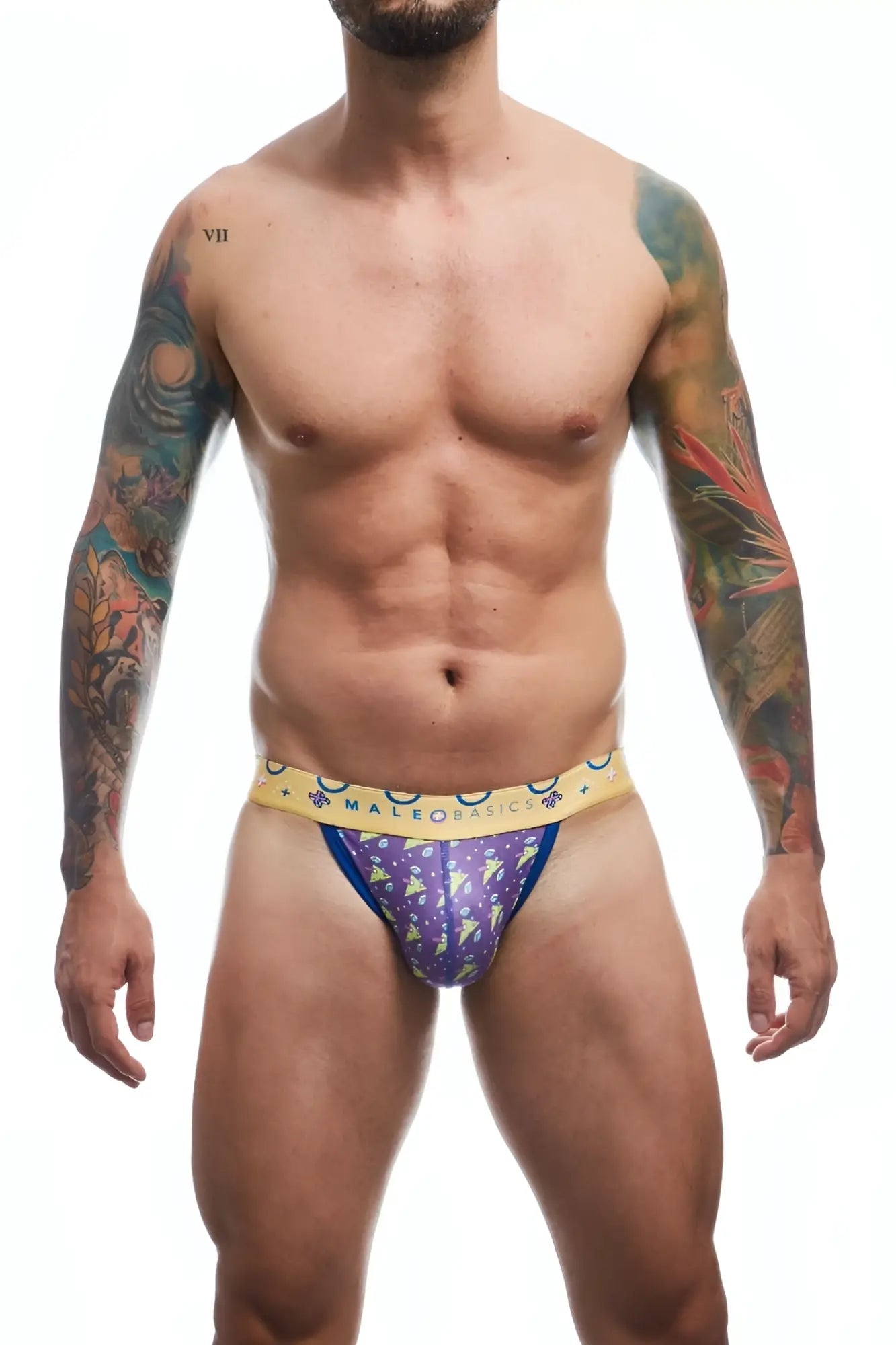 Malebasics hipster jockstrap in purple patterned briefs with a yellow waistband featuring the male basics brand name