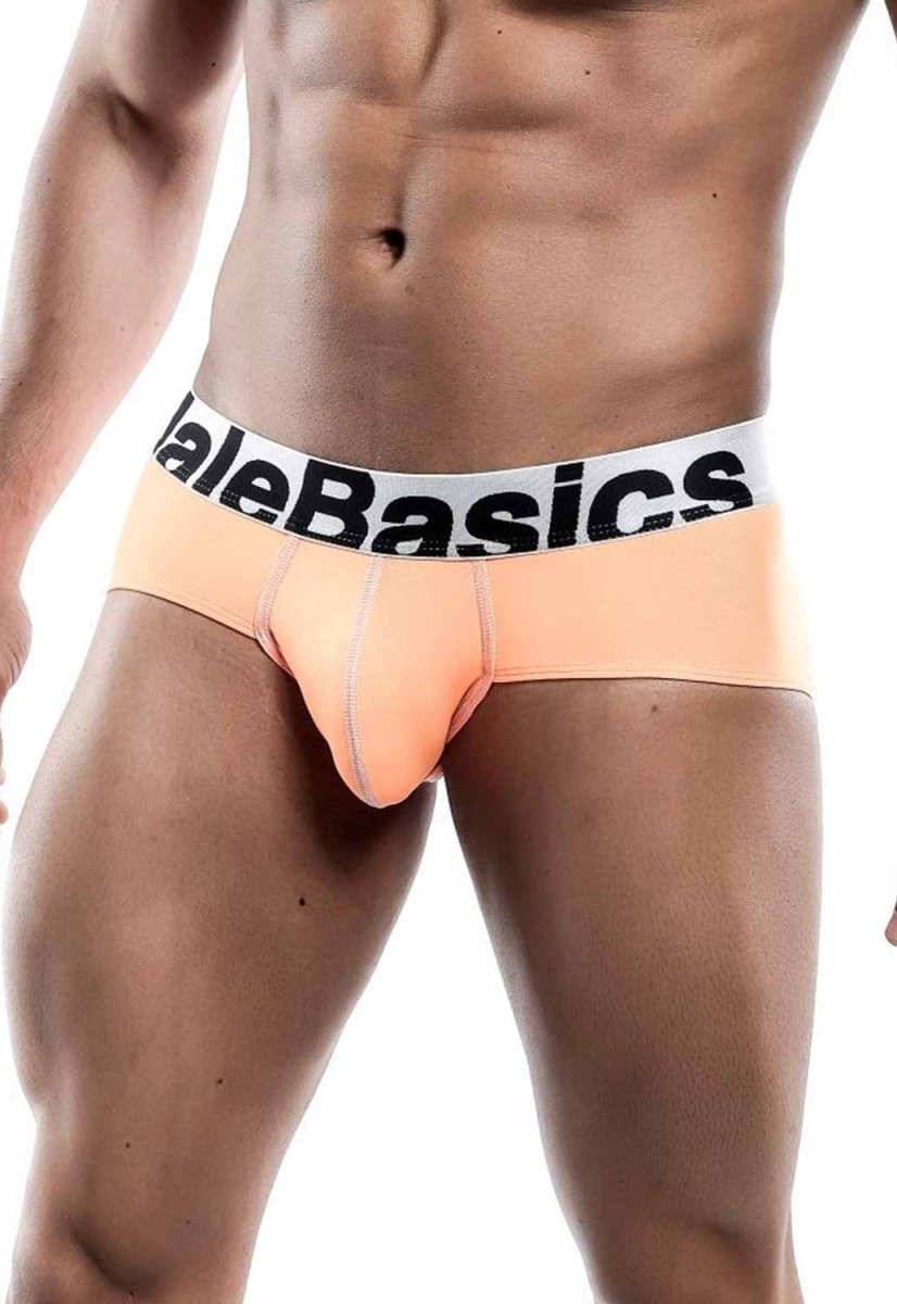 Peach-colored malebasics men’s sports performance hip briefs with white waistband featuring black branding