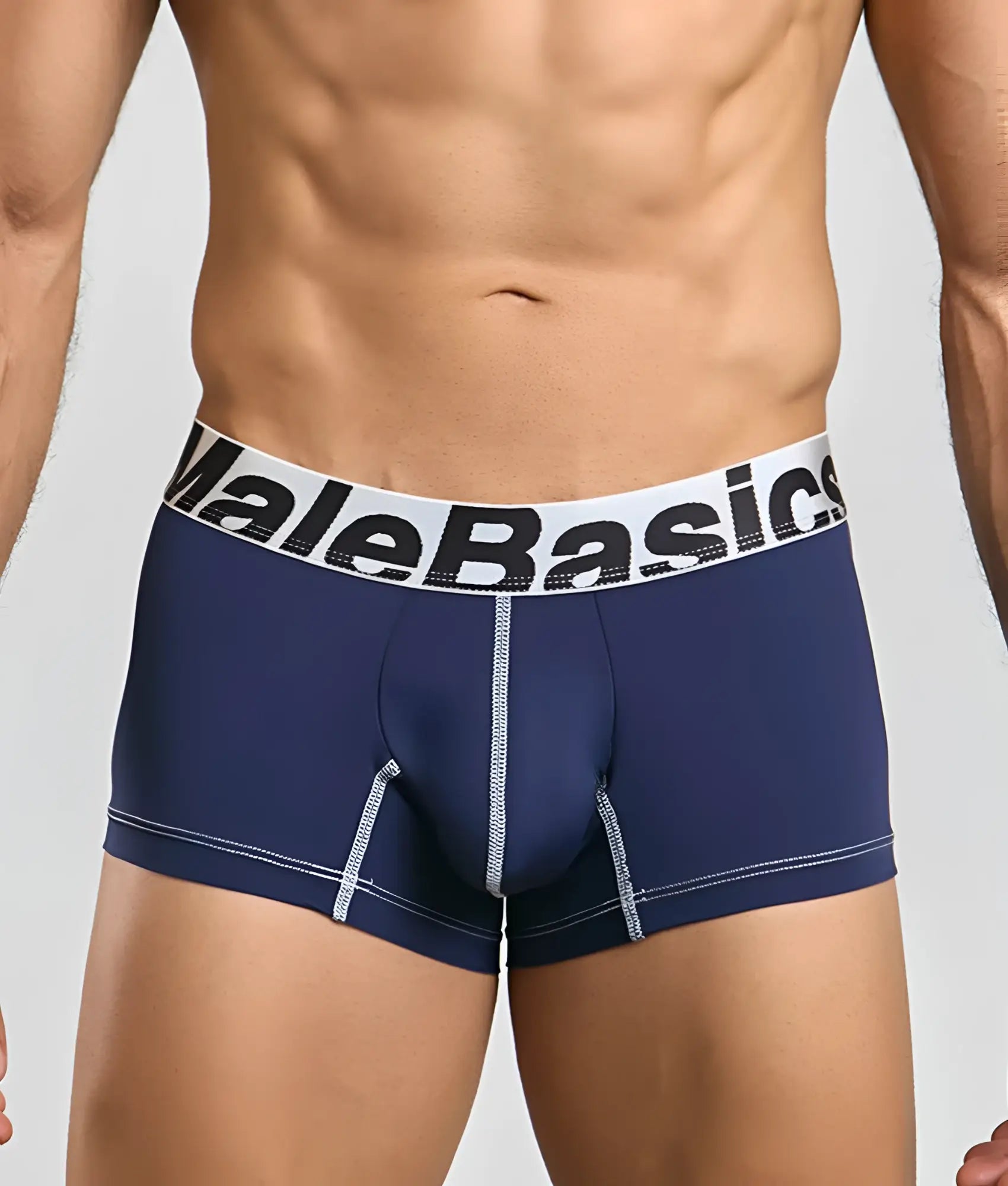 Navy blue malebasics microfiber boxer briefs with white elastic waistband black lettering and silver seam stitching