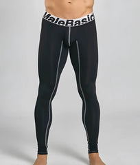 Black malebasics microfiber longjohn compression leggings with gray side panels and white waistband with brand name