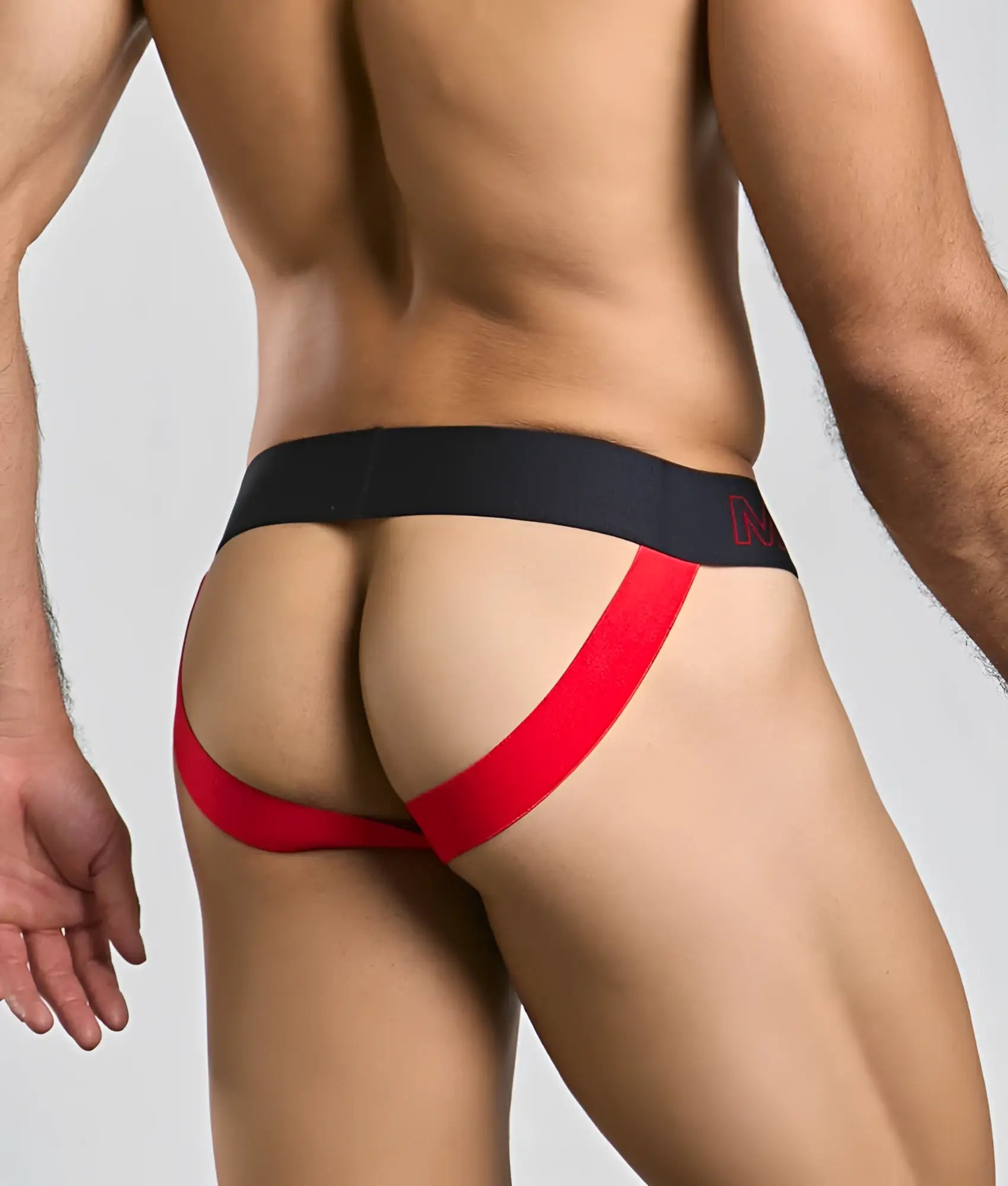 Red and black malebasics neon jock athletic briefs featuring bold red side panels designed for active wear