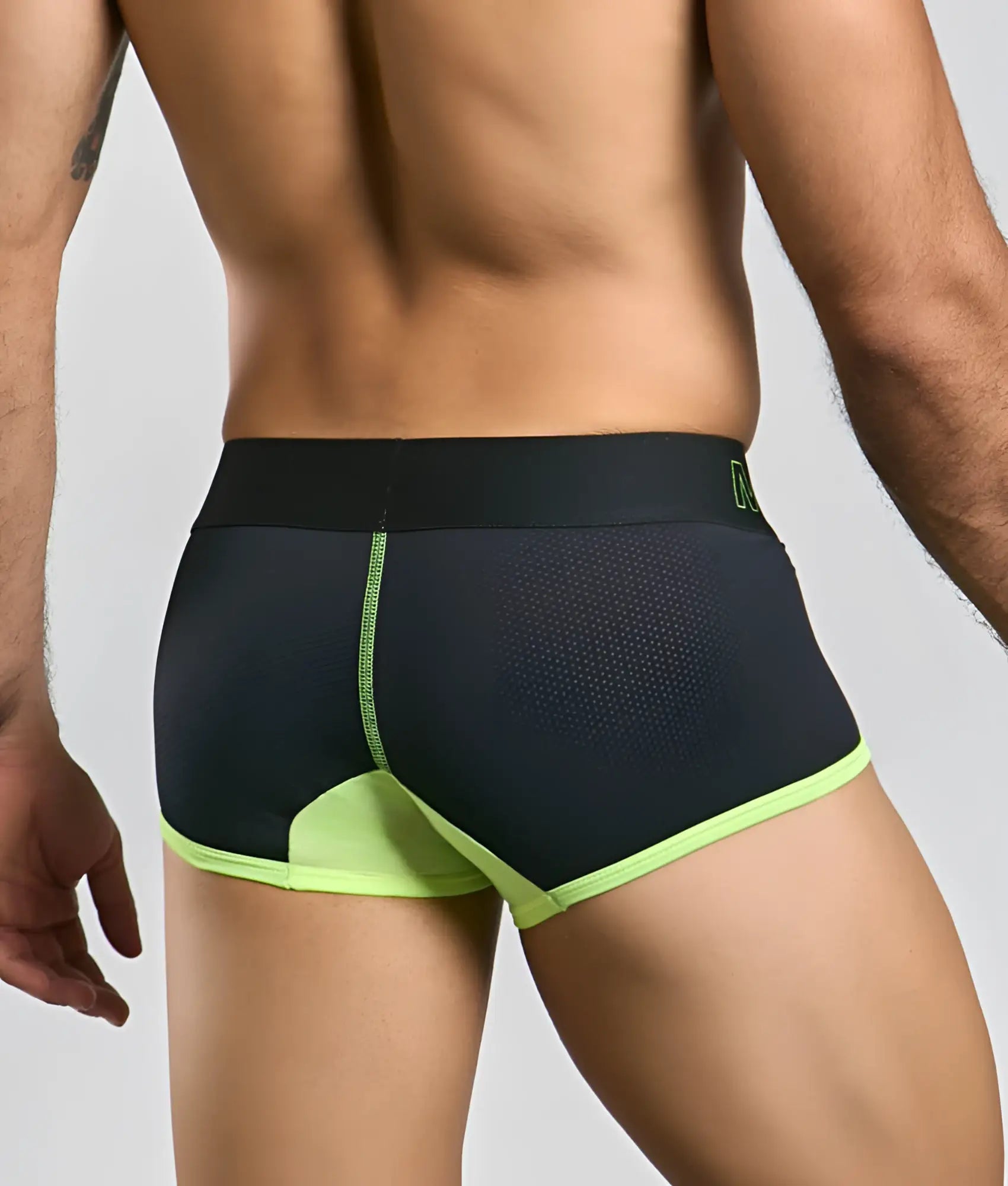 Black athletic briefs malebasics neon trunk with neon green trim and breathable mesh detailing for active wear