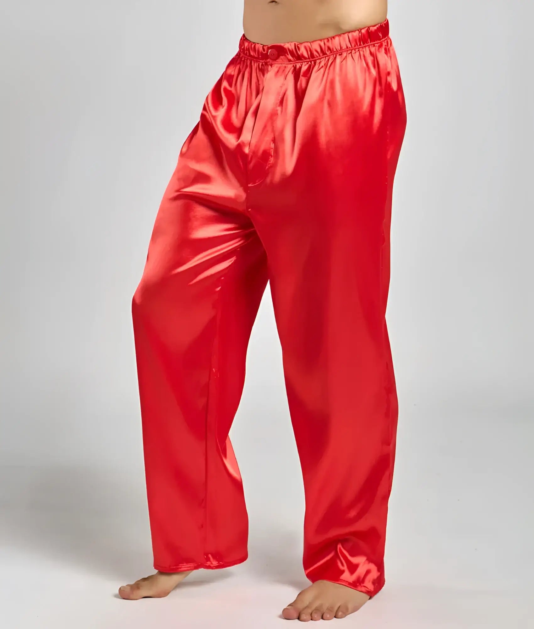 Red satin pajama pants with elastic waistband and glossy finish from malebasics pants satin collection
