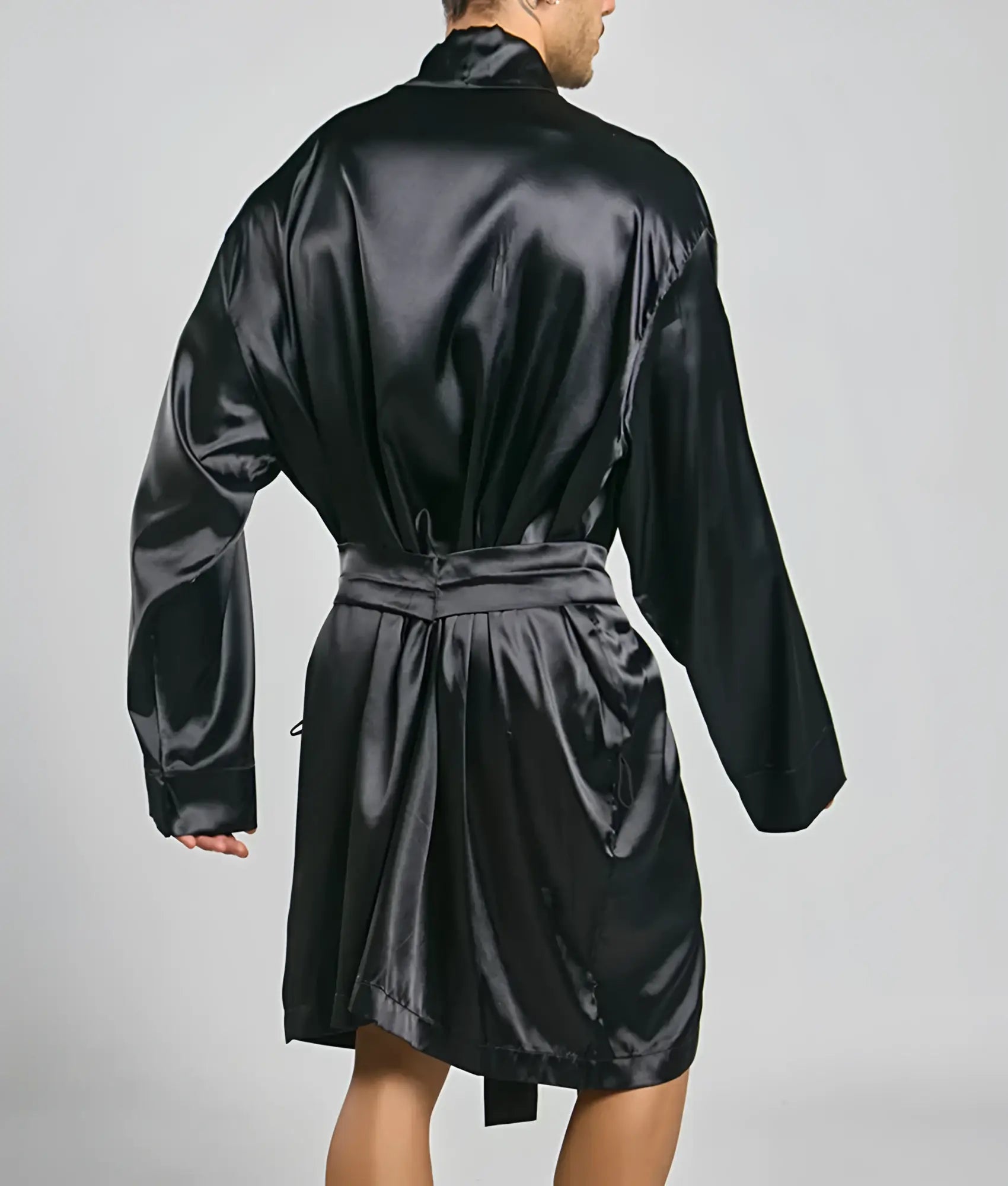Black satin robe with belted waist and long sleeves by Malebasics shown from the back side