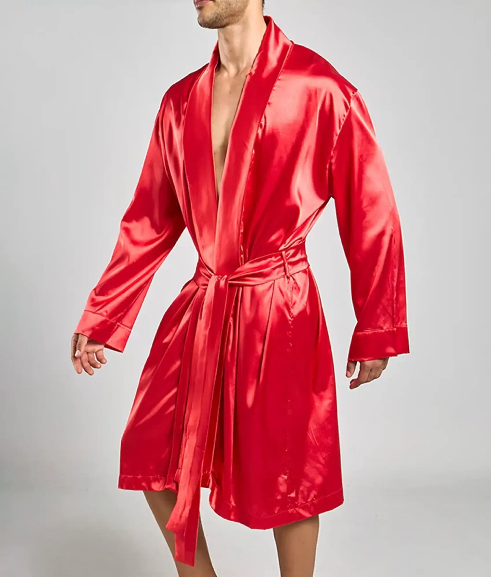 A vibrant red satin robe by Malebasics with a matching belt long sleeves and a classic wrap design