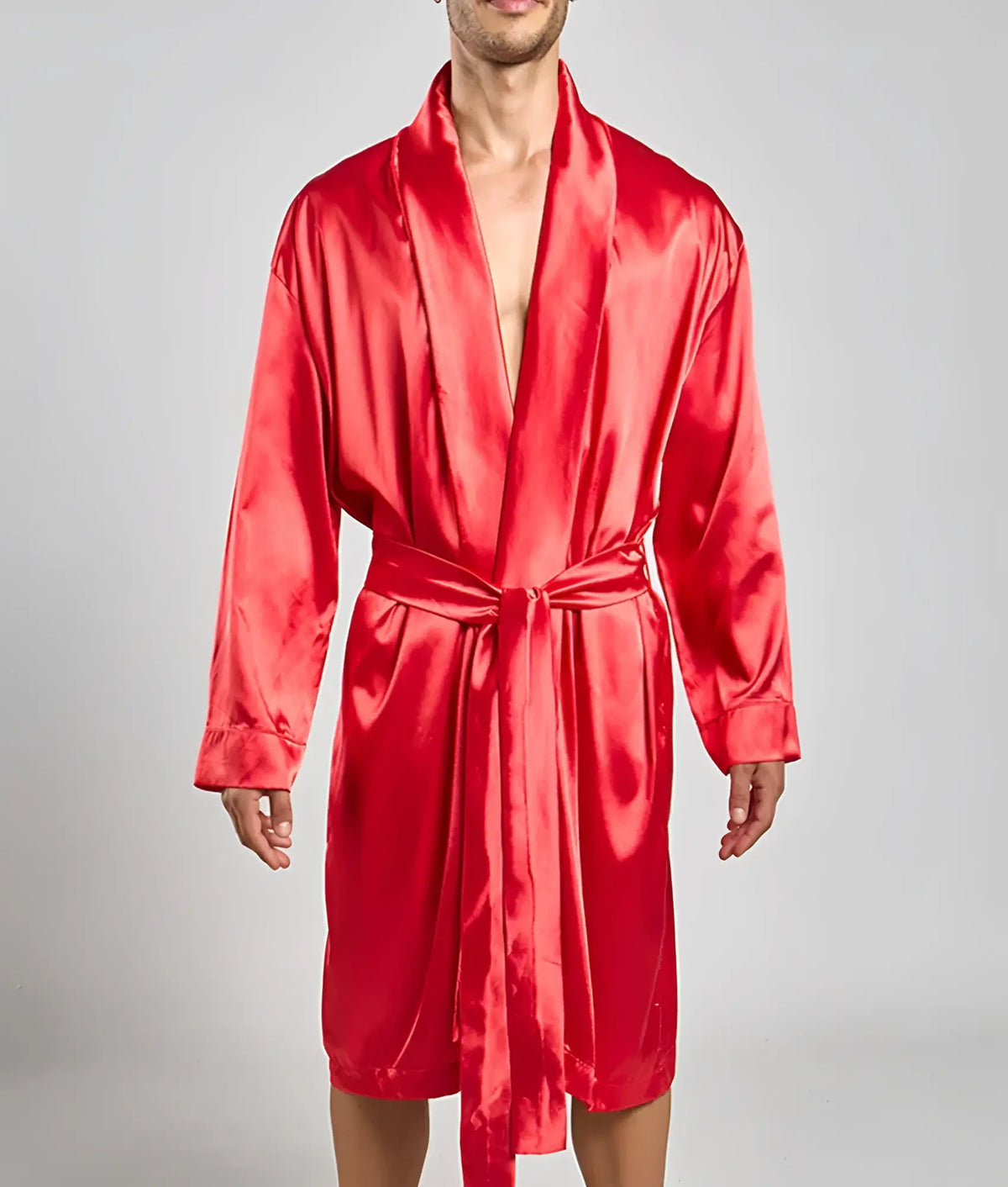 A vibrant red satin robe with long sleeves and a matching belt featuring a classic wrap design from Malebasics