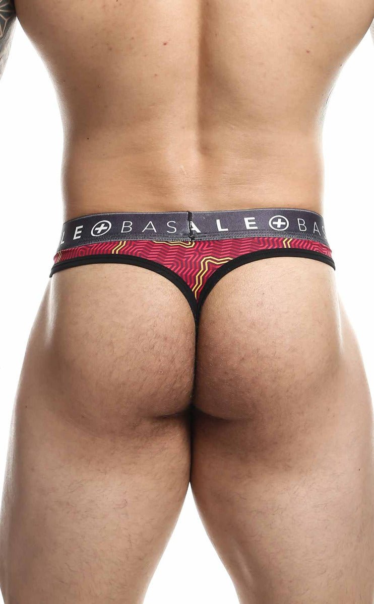 Malebasics mens thong sexy pouch in red and black patterned fabric with gray elastic waistband featuring basale brand name