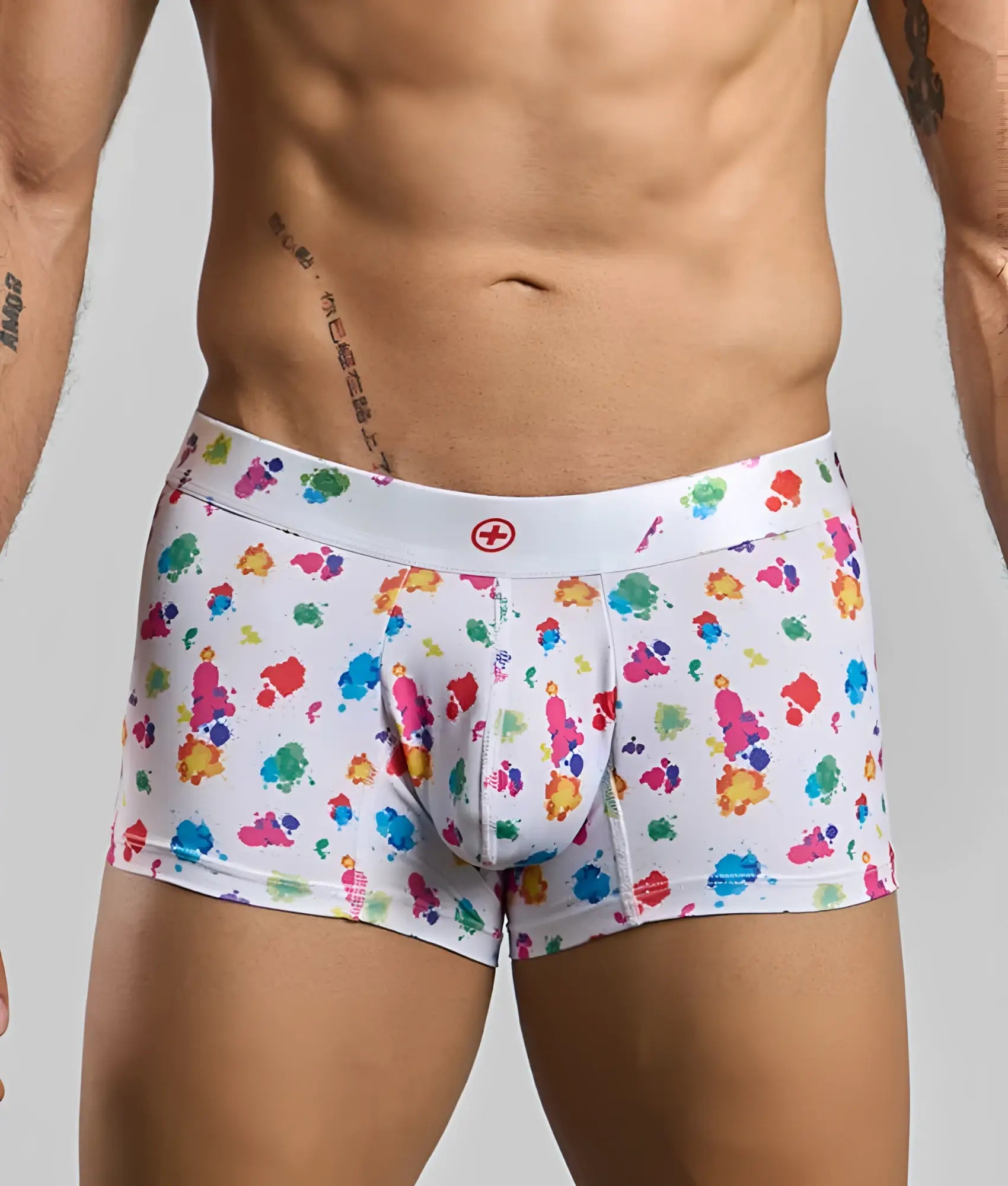 Malebasics trunk hipster white splash boxer briefs with multicolored paint splatter and red cross waistband logo