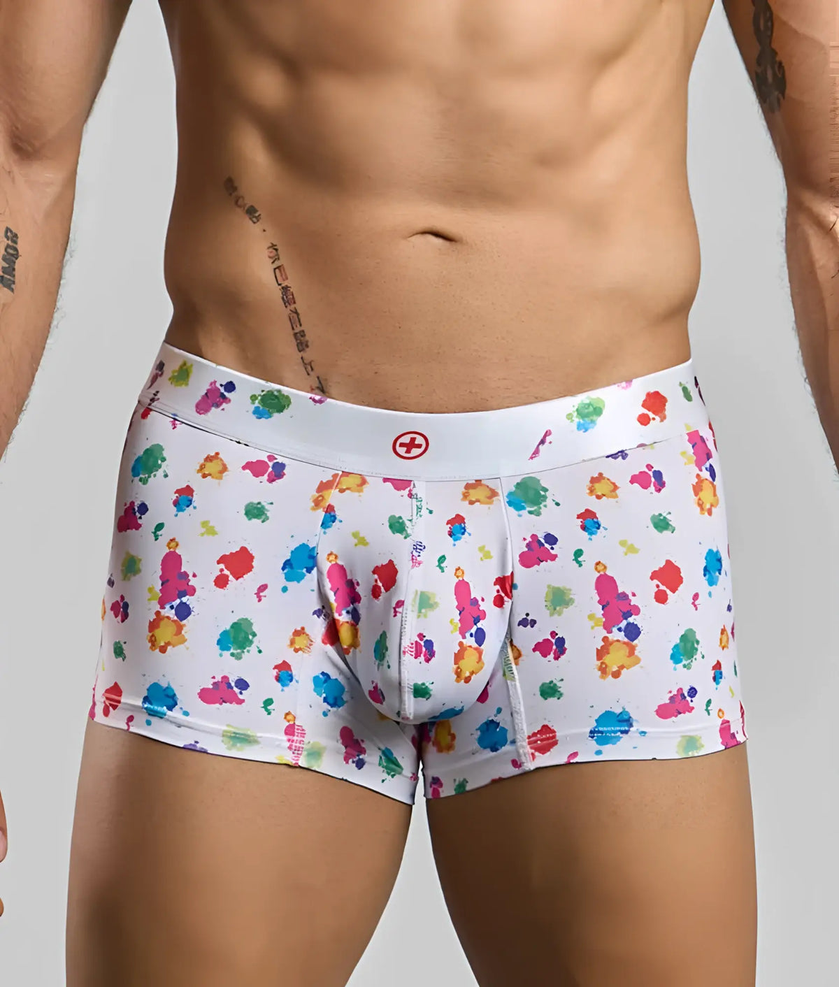 Malebasics trunk hipster white splash boxer briefs with multicolored paint splatter and red cross waistband logo