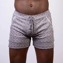 Gray and white mandala linen texture shorts with circular floral pattern and side pockets with zipper closures
