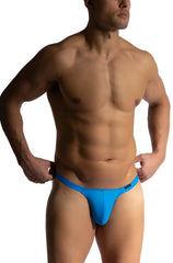Bright blue manstore m2474 beach tower string thong with sleek smooth material and minimalistic design shown from back