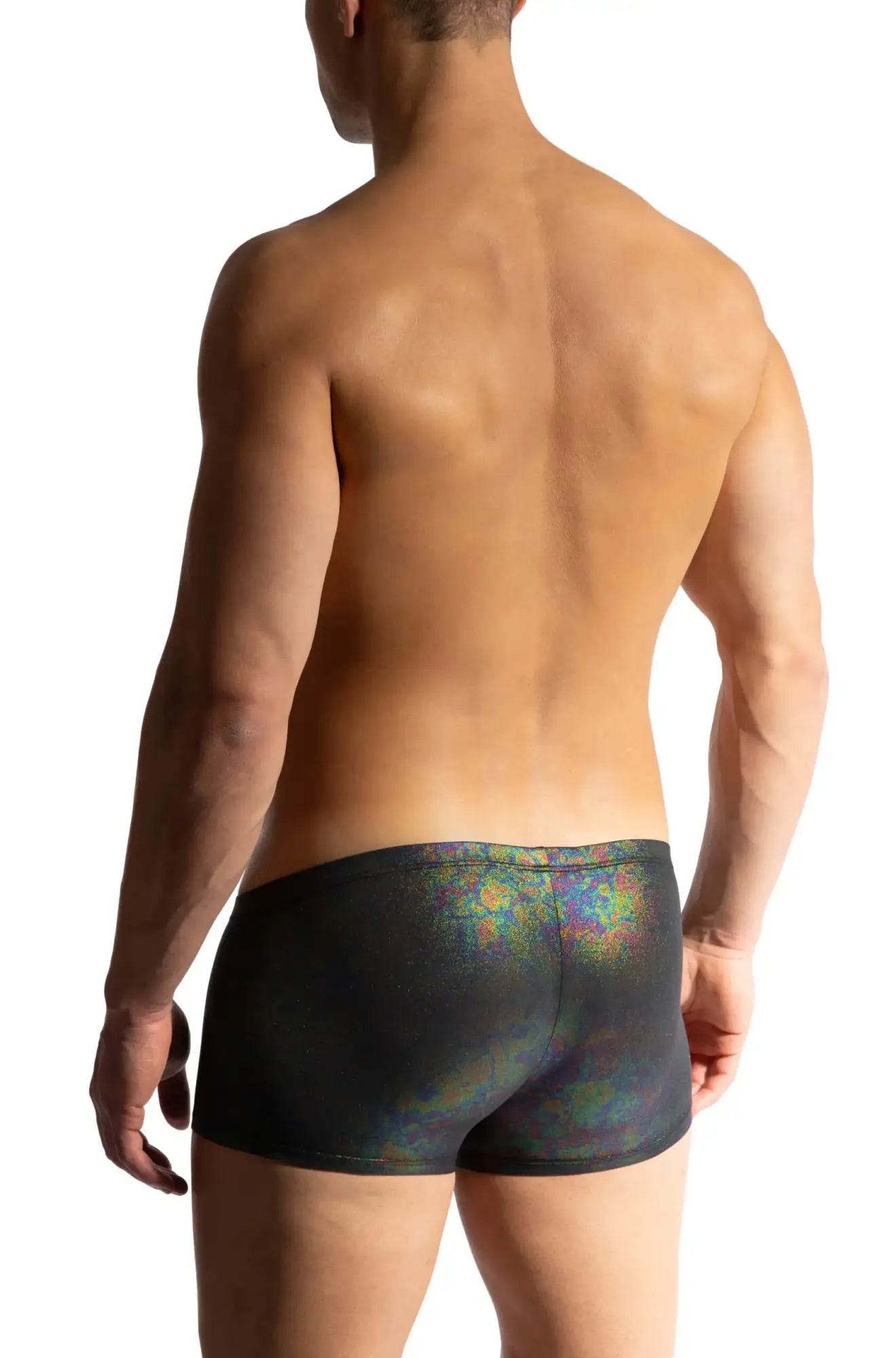 Black briefs with a shimmering iridescent rainbow pattern from MANSTORE oilslick micro pants collection