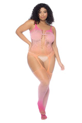 A plus-size woman wearing a mapale 1125x floral ombre fishnet bodystocking in sunset gradient with lace-up front and straps