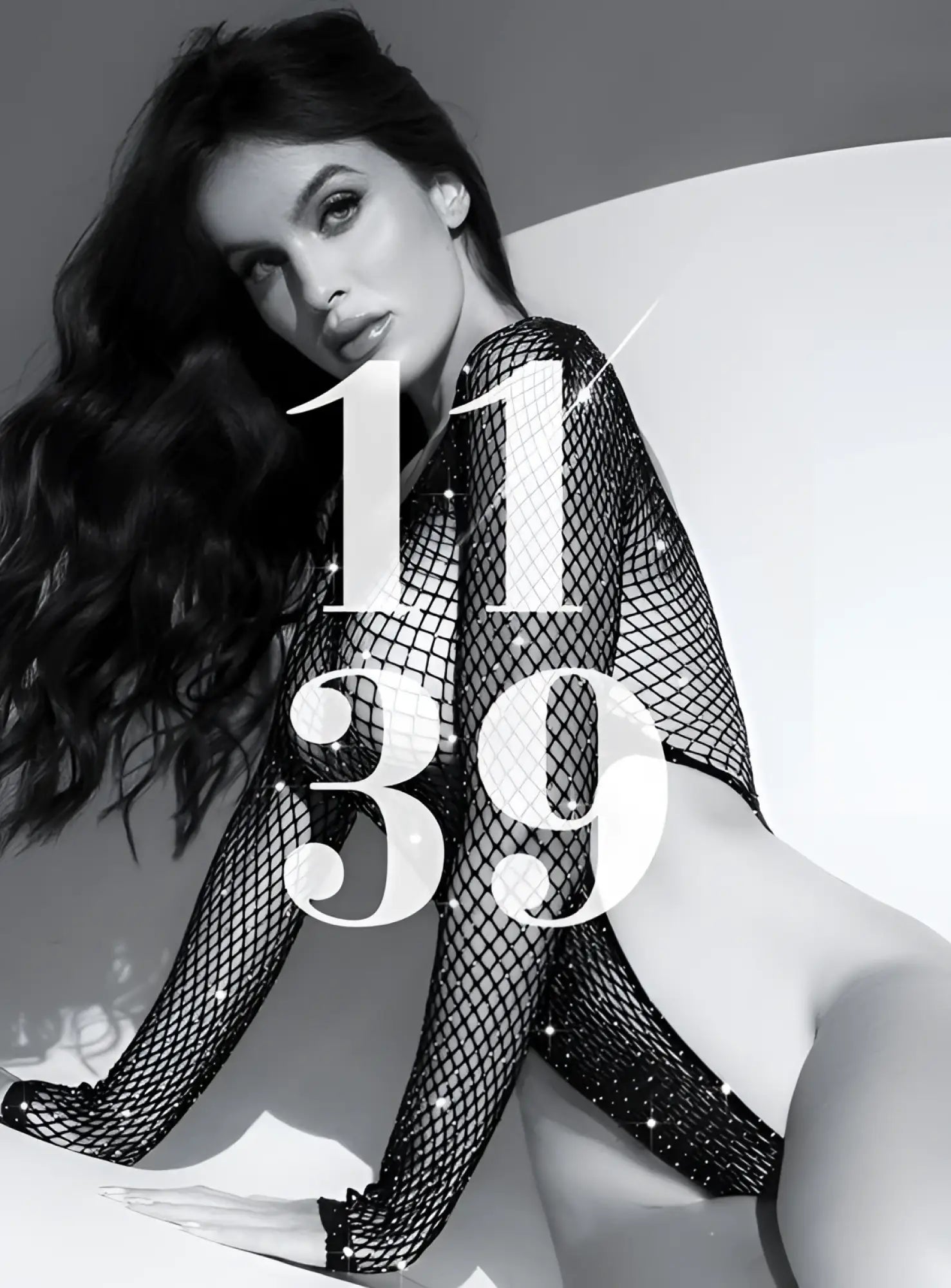 Black long sleeve fishnet bodysuit with sparkling rhinestones by Mapale in glittery texture