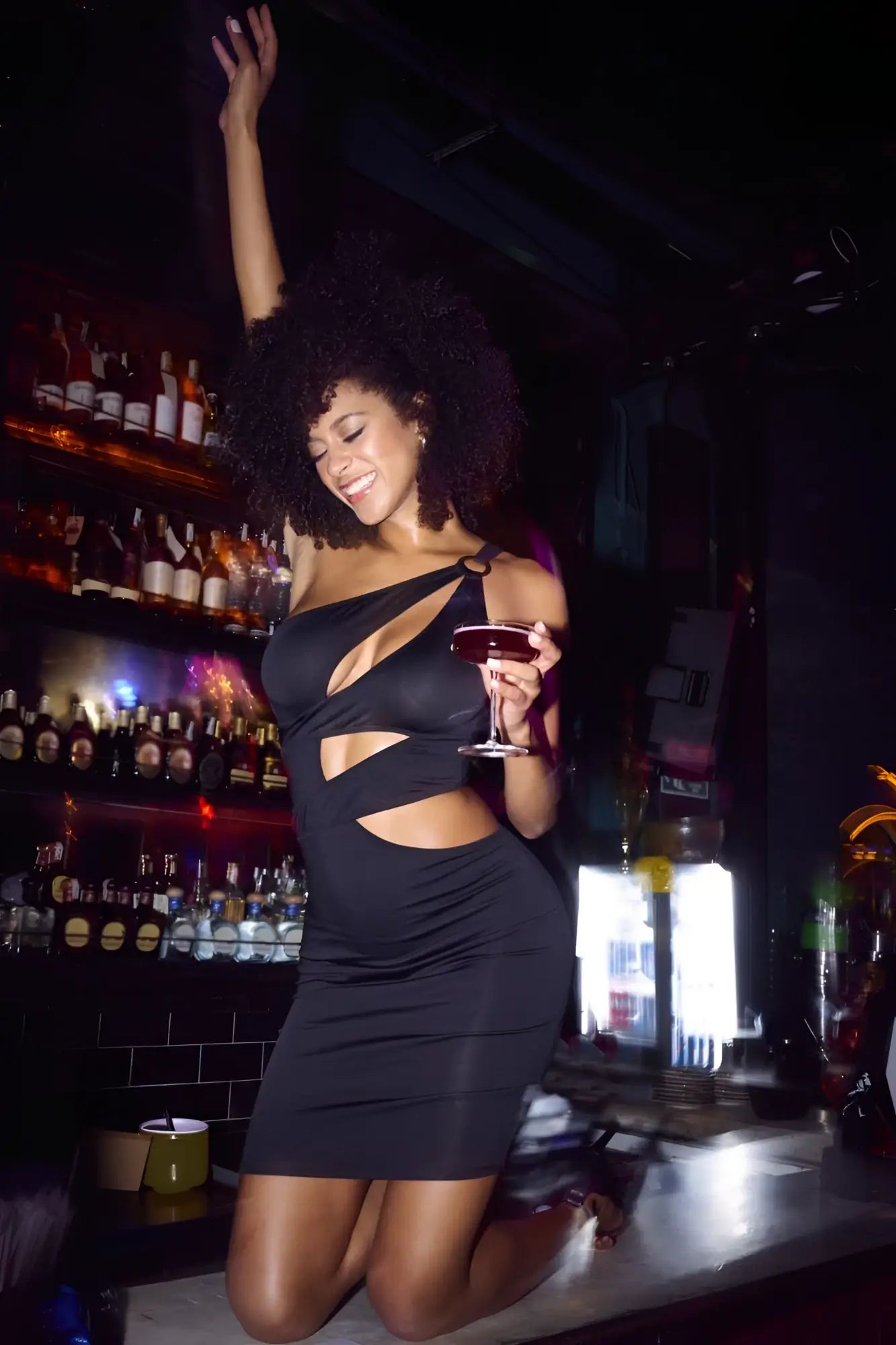 Black Mapale 40004 one-shoulder cut-out dress showcasing a sleek and stylish design in black fabric