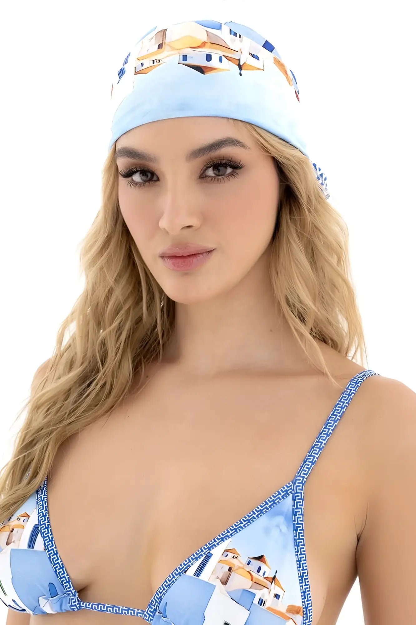 Mapale 47018 all ways scarf in santorini blue featuring light blue fabric with white and beige building patterns